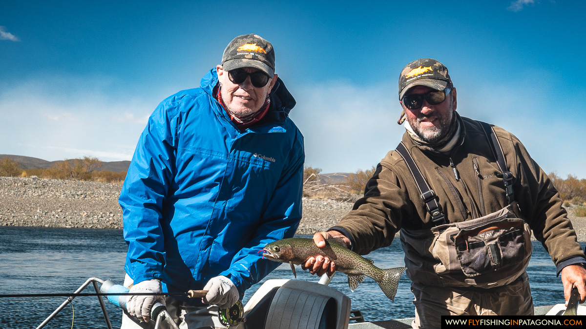 Guide and angler aboard a drift boat on the Collon Cura River