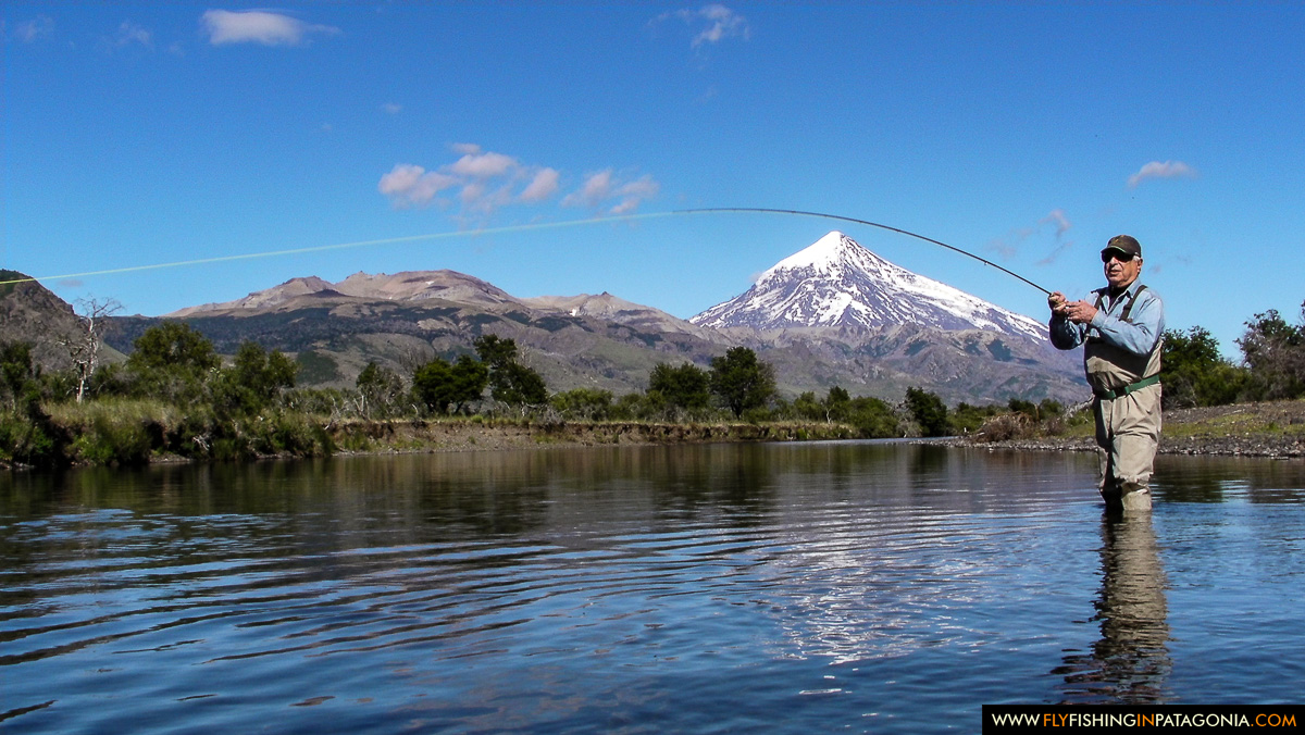 Fly angler fighting a trout near Goat Island on the Malleo River