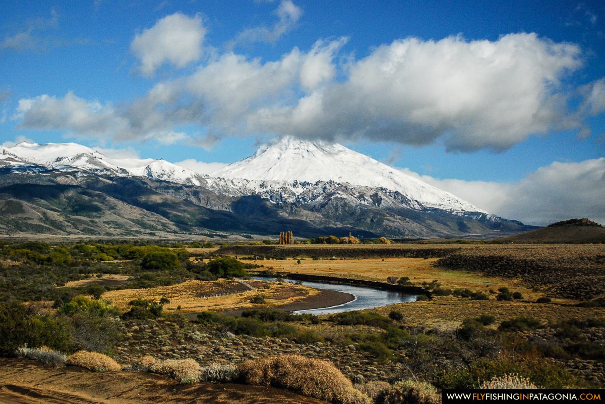 Snow-covered Lanin Volcano above the Red Gate section of the Malleo River