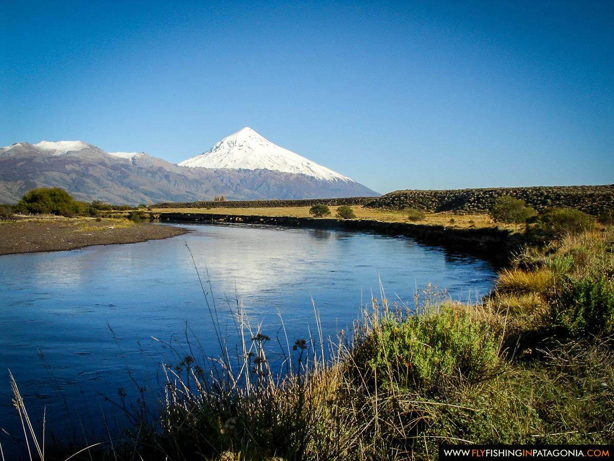 The Red Gate Pool on the Malleo River with Lanin Volcano in the distance