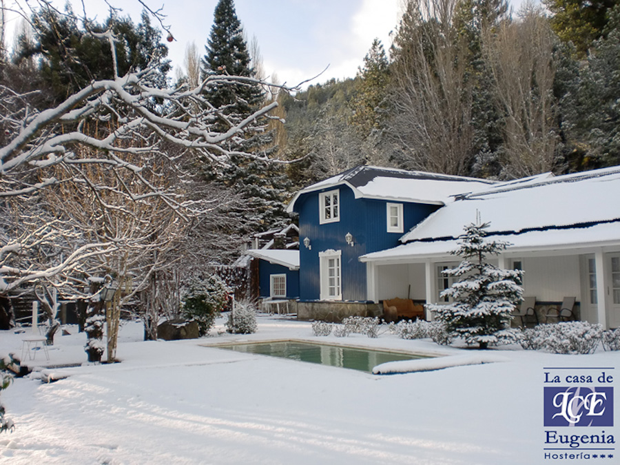 La Casa de Eugenia boutique hosteria covered in snow with pool